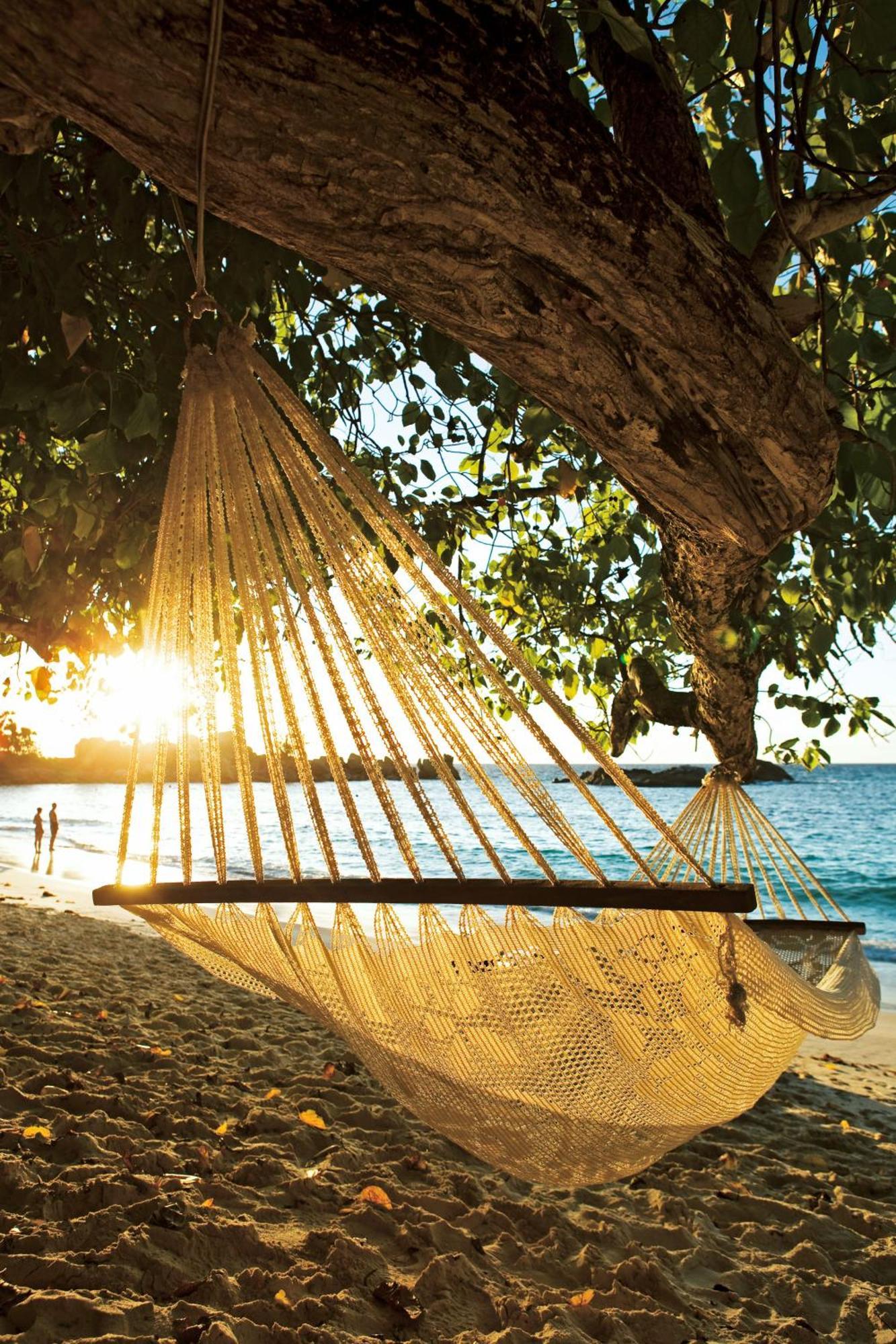 Constance Lemuria Grand Anse  Exterior photo Hammock on a beach