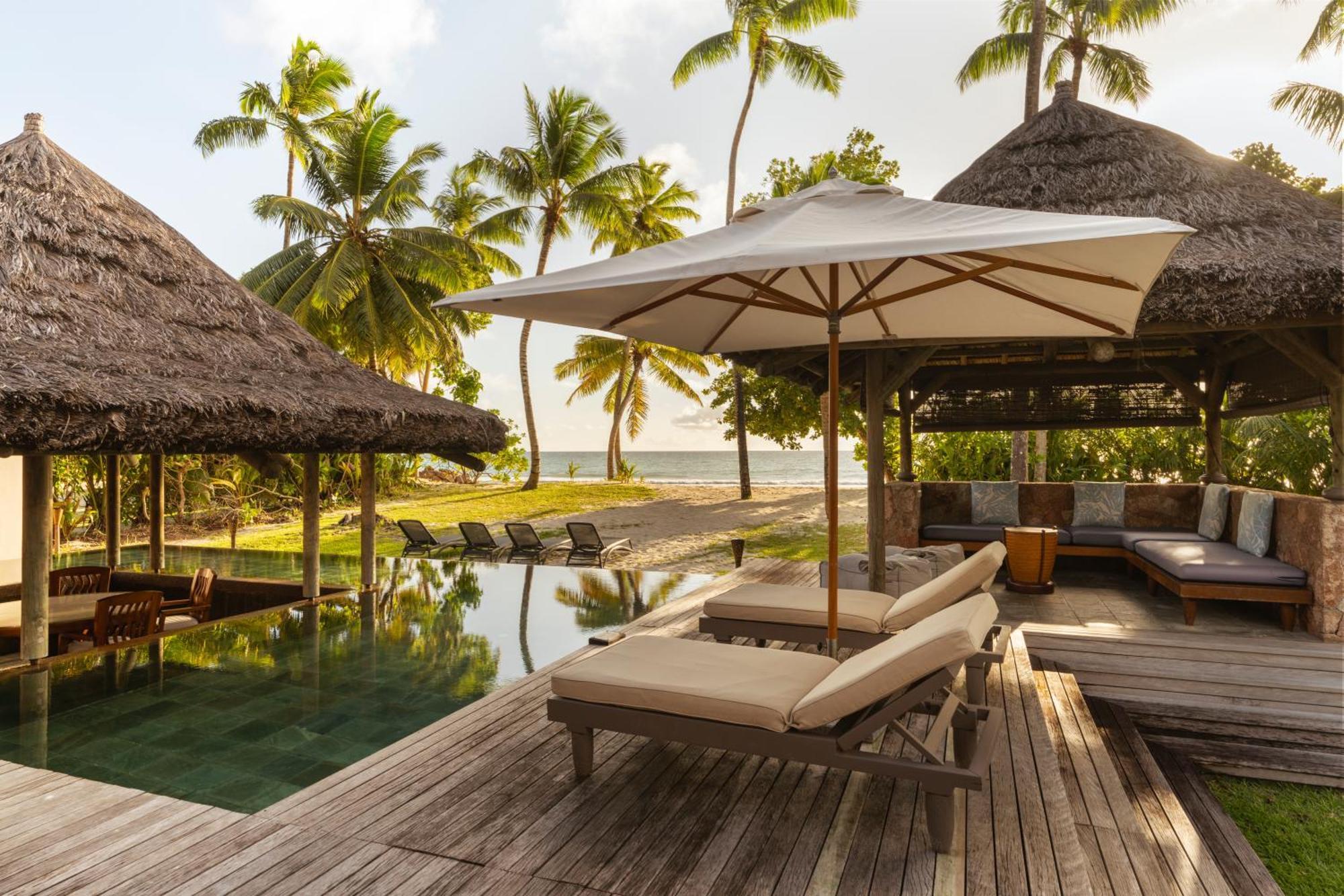 Constance Lemuria Grand Anse  Exterior photo The resort's pool