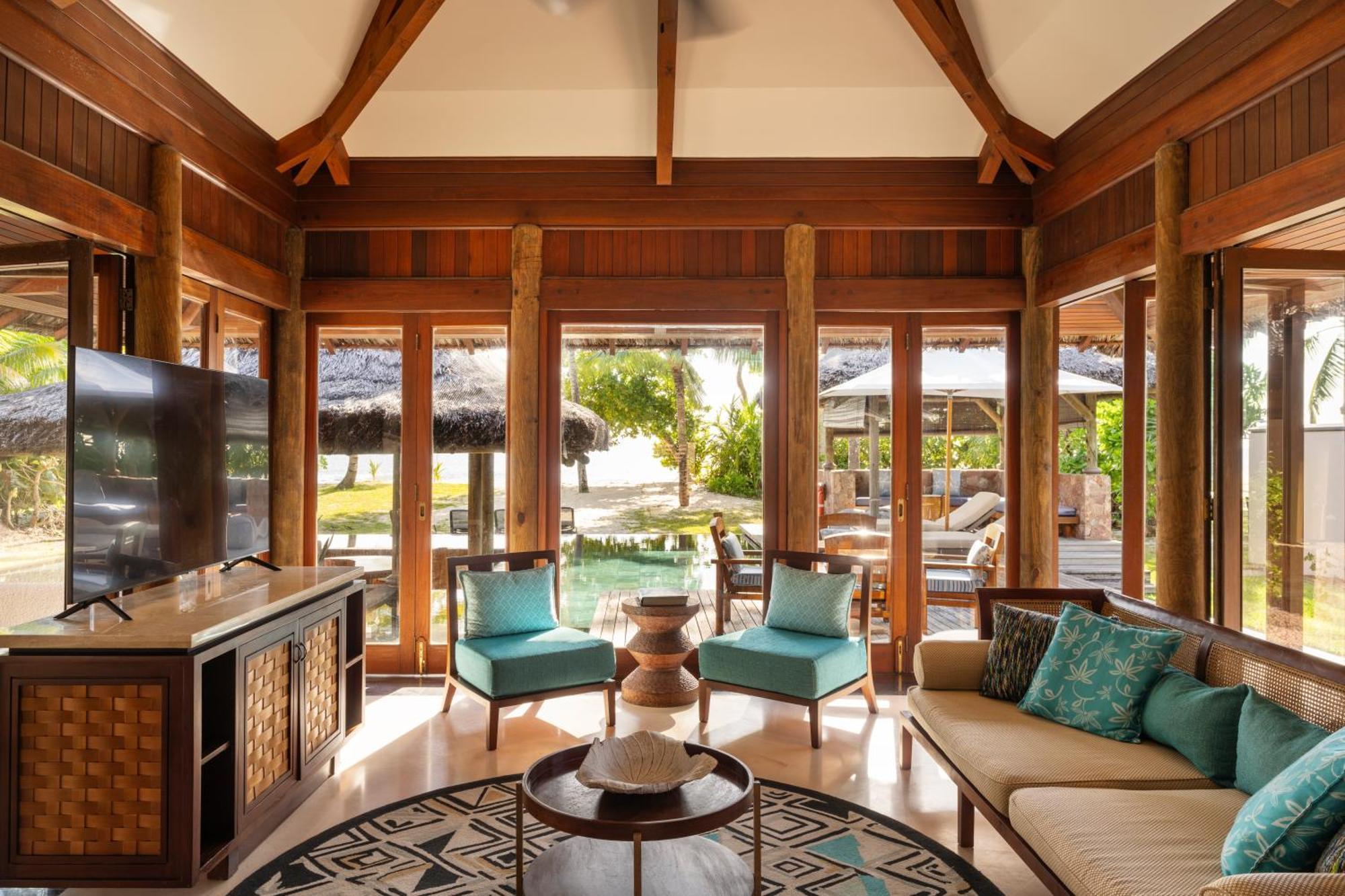 Constance Lemuria Grand Anse  Exterior photo Living room of a Beachfront Villa