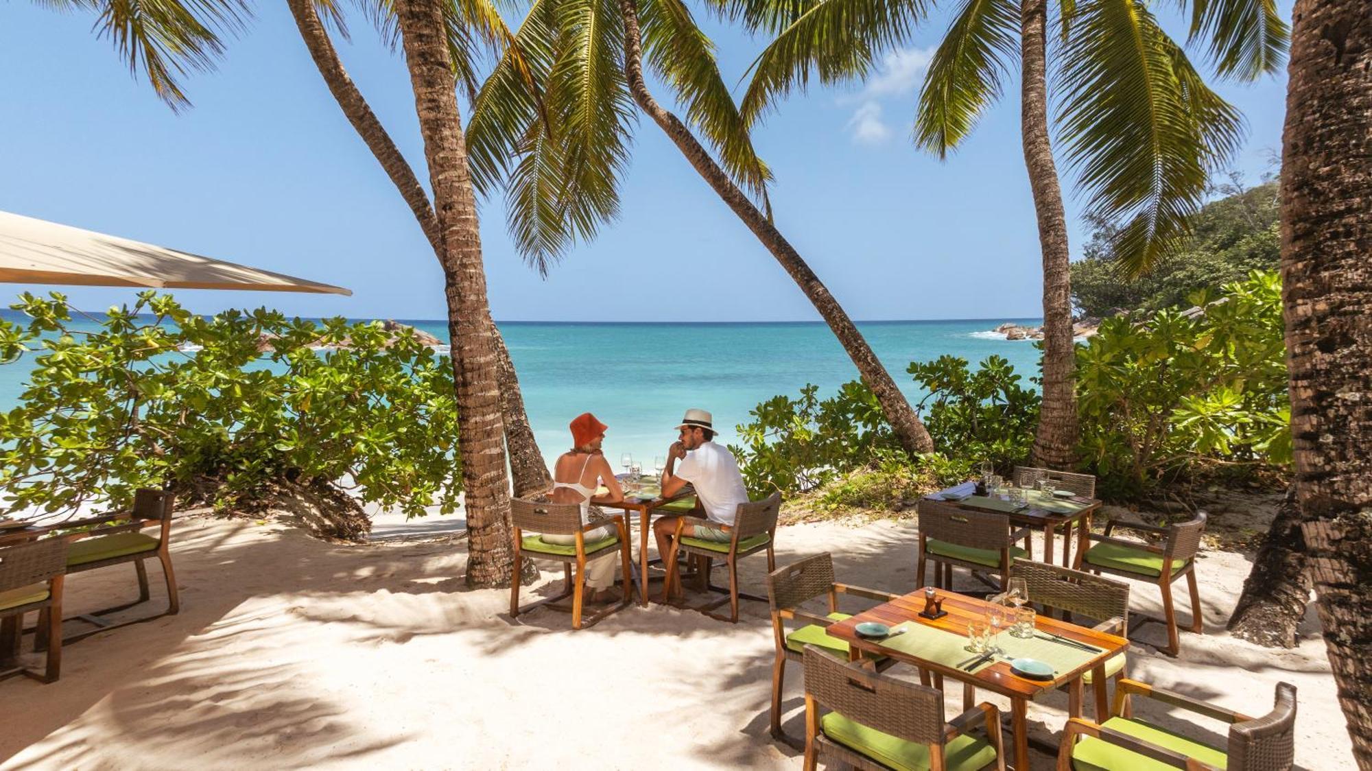 Constance Lemuria Grand Anse  Exterior photo Beachfront dining at Sandals Halcyon Cove